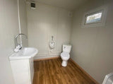 Contenedor sanitario con doble cabina wc